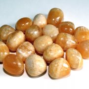 Highly polished Orange Calcite tumble stone size 2-3 cm.