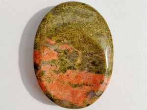 Highly polished Unakite thumb stone 40 x 30 mm. The thumb stones have been designed to have a pleasing feel with the highest quality finish. They are shaped to fit beautifully between the thumb and fingers. Being a natural product these stones may have natural blemishes and vary in colour and banding. www.naturalhealingshop.co.uk based in Nuneaton for crystals, spiritual healing, meditation, relaxation, spiritual development,workshops.