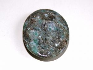 Highly polished Chrome-Mica thumb stone.