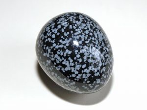 Highly polished Snowflake Obsidian egg approx height 45 mm.