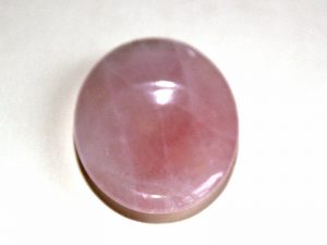 Highly polished Rose Quartz thumb stone.