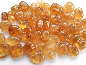Highly polished Honey Calcite stone size 20-30 mm.