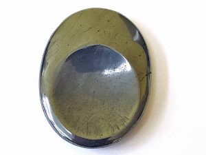 Highly polished Hematite thumb stone.