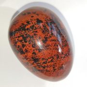Highly polished Mahogany Jasper egg approx height 45 mm.