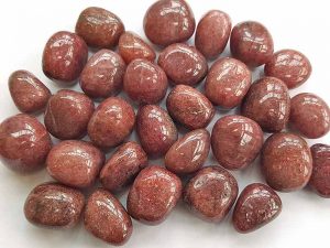 Highly polished Red Mica tumble stone size 20-30 mm.