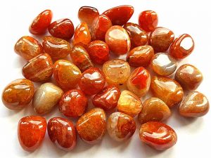 Highly polished Fire Agate tumble stone size 2-3 cm.