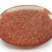 Highly polished Red Mica palm stone 70 x 40 mm.