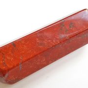 Highly polished Red Jasper Wand wand approximate height 70 mm Used in crystal healing and meditation. Excellent for collectors. Being a natural product this crystal may have natural blemishes and vary in colour. www.naturalhealingshop.co.uk based in Nuneaton for crystals, spiritual healing, meditation, relaxation, spiritual development,workshops.
