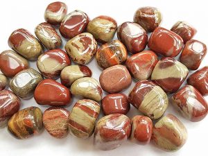 Highly polished Red Rhyolite tumble stone size 2-3 cm. www.naturalhealingshop.co.uk based in Nuneaton for crystals, spiritual healing, meditation, relaxation, spiritual development,workshops.