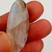 Highly polished Rainbow Moonstone thumb stone 40 x 30 mm. The thumb stones have been designed to have a pleasing feel with the highest quality finish. They are shaped to fit beautifully between the thumb and fingers. Being a natural product these stones may have natural blemishes and vary in colour and banding. www.naturalhealingshop.co.uk based in Nuneaton for crystals, spiritual healing, meditation, relaxation, spiritual development,workshops.
