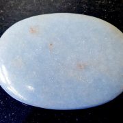 Highly polished Angelite palm stone 70 x 40 mm. The palm stones are made from the best grade rough materials to produce a well finished, highly polished product. Used by crystal healers and general therapists for massage and similar treatments. Also perfect for collectors. Being a natural product these stones may have natural blemishes and vary in colour and banding. www.naturalhealingshop.co.uk based in Nuneaton for crystals, spiritual healing, meditation, relaxation, spiritual development,workshops.