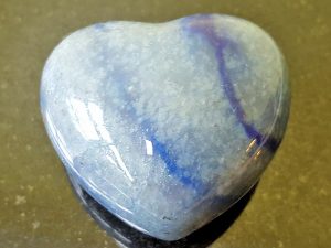 Highly polished Blue Quartz Heart approx 45 mm. These hearts are perfect for a gift! There are purple velvet pouches or organza bags you can purchase to pop them into for the finishing touch. Being a natural product these stones may have natural blemishes and vary in colour and banding. www.naturalhealingshop.co.uk based in Nuneaton for crystals, spiritual healing, meditation, relaxation, spiritual development,workshops.