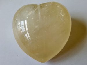 Highly polished Yellow Calcite Heart approx 45 mm. These hearts are perfect for a gift! There are purple velvet pouches or organza bags you can purchase to pop them into for the finishing touch. Being a natural product these stones may have natural blemishes and vary in colour and banding. www.naturalhealingshop.co.uk based in Nuneaton for crystals, spiritual healing, meditation, relaxation, spiritual development,workshops.