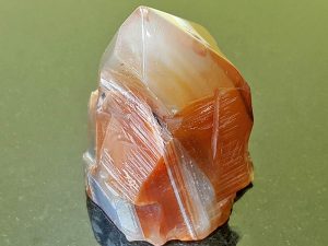 Highly polished Carnelian Point approximate height 75 mm. Being a natural product this crystal may have natural blemishes and vary in colour. www.naturalhealingshop.co.uk based in Nuneaton for crystals, spiritual healing, meditation, relaxation, spiritual development,workshops.