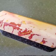 Highly polished Mookaite Wand wand approximate height 70 mm Used in crystal healing and meditation. Excellent for collectors. Being a natural product this crystal may have natural blemishes and vary in colour. www.naturalhealingshop.co.uk based in Nuneaton for crystals, spiritual healing, meditation, relaxation, spiritual development,workshops.