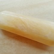 Highly polished Orange Calcite wand approximate height 70 mm Used in crystal healing and meditation. Excellent for collectors. Being a natural product this crystal may have natural blemishes and vary in colour. www.naturalhealingshop.co.uk based in Nuneaton for crystals, spiritual healing, meditation, relaxation, spiritual development,workshops.