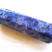 Highly polished Sodalite wand approximate height 70 mm Used in crystal healing and meditation. Excellent for collectors. Being a natural product this crystal may have natural blemishes and vary in colour. www.naturalhealingshop.co.uk based in Nuneaton for crystals, spiritual healing, meditation, relaxation, spiritual development,workshops.
