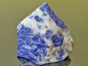 Highly polished Sodalite Point approximate height 70 mm. Being a natural product this crystal may have natural blemishes and vary in colour. www.naturalhealingshop.co.uk based in Nuneaton for crystals, spiritual healing, meditation, relaxation, spiritual development,workshops.