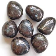 Highly polished Astrophyllite tumble stone size 2.5-3 cm Being a natural product this crystal may have natural blemishes and vary in colour. www.naturalhealingshop.co.uk based in Nuneaton for crystals, spiritual healing, meditation, relaxation, spiritual development,workshops.