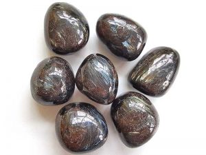 Highly polished Astrophyllite tumble stone size 2.5-3 cm Being a natural product this crystal may have natural blemishes and vary in colour. www.naturalhealingshop.co.uk based in Nuneaton for crystals, spiritual healing, meditation, relaxation, spiritual development,workshops.