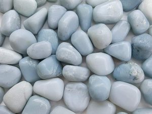 Highly polished Blue Chalcedony tumble stone size 2-3 cm. Being a natural product these stones may have natural blemishes and vary in colour, banding and shape. See photograph. www.naturalhealingshop.co.uk based in Nuneaton for crystals, spiritual healing, meditation, relaxation, spiritual development,workshops.