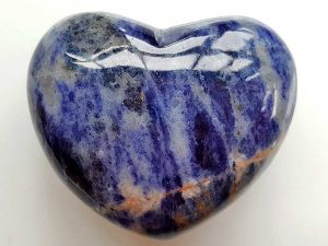 Highly polished Sodalite Heart approx 45 mm. These hearts are perfect for a gift! There are purple velvet pouches or organza bags you can purchase to pop them into for the finishing touch. Being a natural product these stones may have natural blemishes and vary in colour and banding. www.naturalhealingshop.co.uk based in Nuneaton for crystals, spiritual healing, meditation, relaxation, spiritual development,workshops.