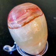 Highly polished onyx egg approximate height 45 mm.