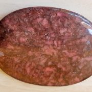 Highly polished Rhodonite palm stone 70 x 40 mm. The palm stones are made from the best grade rough materials to produce a well finished, highly polished product. Used by crystal healers and general therapists for massage and similar treatments. Also perfect for collectors. Being a natural product these stones may have natural blemishes and vary in colour and banding. www.naturalhealingshop.co.uk based in Nuneaton for crystals, spiritual healing, meditation, relaxation, spiritual development,workshops.