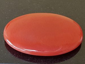 Highly polished carnelian palm stone 70 x 40 mm. The palm stones are made from the best grade rough materials to produce a well finished, highly polished product. Used by crystal healers and general therapists for massage and similar treatments. Also perfect for collectors. Being a natural product these stones may have natural blemishes and vary in colour and banding. www.naturalhealingshop.co.uk based in Nuneaton for crystals, spiritual healing, meditation, relaxation, spiritual development,workshops.