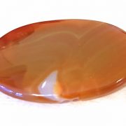 Highly polished Carnelian palm stone 70 x 40 mm. The palm stones are made from the best grade rough materials to produce a well finished, highly polished product. Used by crystal healers and general therapists for massage and similar treatments. Also perfect for collectors. Being a natural product these stones may have natural blemishes and vary in colour and banding. www.naturalhealingshop.co.uk based in Nuneaton for crystals, spiritual healing, meditation, relaxation, spiritual development,workshops.