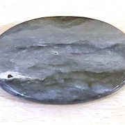 Highly polished Merlinite palm stone 70 x 40 mm. The palm stones are made from the best grade rough materials to produce a well finished, highly polished product. Used by crystal healers and general therapists for massage and similar treatments. Also perfect for collectors. Being a natural product these stones may have natural blemishes and vary in colour and banding. www.naturalhealingshop.co.uk based in Nuneaton for crystals, spiritual healing, meditation, relaxation, spiritual development,workshops.