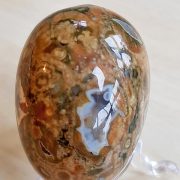 Highly polished Rhyolite egg approximate height 45 mm. Beautiful to collect or hold and meditate with. Being a natural product these stones may have natural blemishes and vary in colour and banding. www.naturalhealingshop.co.uk based in Nuneaton for crystals, spiritual healing, meditation, relaxation, spiritual development,workshops.