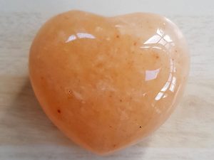 Highly polished Aventurine Peach Heart approx 45 mm. www.naturalhealingshop.co.uk based in Nuneaton for crystals, spiritual healing, meditation, relaxation, spiritual development,workshops.