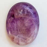 Highly polished Amethyst thumb stone 40 x 30 mm. The thumb stones have been designed to have a pleasing feel with the highest quality finish. They are shaped to fit beautifully between the thumb and fingers. Being a natural product these stones may have natural blemishes and vary in colour and banding. www.naturalhealingshop.co.uk based in Nuneaton for crystals, spiritual healing, meditation, relaxation, spiritual development,workshops.