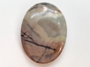 Highly polished Picasso jasper thumb stone 40 x 30 mm. The thumb stones have been designed to have a pleasing feel with the highest quality finish. They are shaped to fit beautifully between the thumb and fingers. Being a natural product these stones may have natural blemishes and vary in colour and banding. www.naturalhealingshop.co.uk based in Nuneaton for crystals, spiritual healing, meditation, relaxation, spiritual development,workshops.
