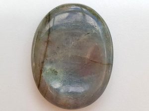 Highly polished Labradorite thumb stone 40 x 30 mm. The thumb stones have been designed to have a pleasing feel with the highest quality finish. They are shaped to fit beautifully between the thumb and fingers. Being a natural product these stones may have natural blemishes and vary in colour and banding. www.naturalhealingshop.co.uk based in Nuneaton for crystals, spiritual healing, meditation, relaxation, spiritual development,workshops.