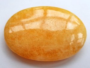 Highly polished Orange Calcite palm stone 70 x 50 mm. The palm stones are made from the best grade rough materials to produce a well finished, highly polished product. Used by crystal healers and general therapists for massage and similar treatments. Also perfect for collectors. Being a natural product these stones may have natural blemishes and vary in colour and banding. www.naturalhealingshop.co.uk based in Nuneaton for crystals, spiritual healing, meditation, relaxation, spiritual development,workshops.