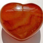 Highly polished Carnelian Heart approx 45 mm. These hearts are perfect for a gift! There are purple velvet pouches or organza bags you can purchase to pop them into for the finishing touch. Being a natural product these stones may have natural blemishes and vary in colour and banding. www.naturalhealingshop.co.uk based in Nuneaton for crystals, spiritual healing, meditation, relaxation, spiritual development,workshops.