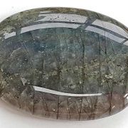 Highly polished Labradorite palm stone 70 x 40 mm. The palm stones are made from the best grade rough materials to produce a well finished, highly polished product. Used by crystal healers and general therapists for massage and similar treatments. Also perfect for collectors. Being a natural product these stones may have natural blemishes and vary in colour and banding. www.naturalhealingshop.co.uk based in Nuneaton for crystals, spiritual healing, meditation, relaxation, spiritual development,workshops.