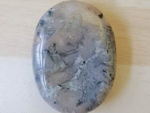 Highly polished moss agate thumb stone 40 x 30 mm. The thumb stones have been designed to have a pleasing feel with the highest quality finish. They are shaped to fit beautifully between the thumb and fingers. Being a natural product these stones may have natural blemishes and vary in colour and banding. www.naturalhealingshop.co.uk based in Nuneaton for crystals, spiritual healing, meditation, relaxation, spiritual development,workshops.