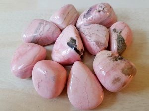 Highly polished Rhodochrosite stone size 20-30 mm. Being a natural product these stones may have natural blemishes and vary in colour and banding. www.naturalhealingshop.co.uk based in Nuneaton for crystals, spiritual healing, meditation, relaxation, spiritual development,workshops.