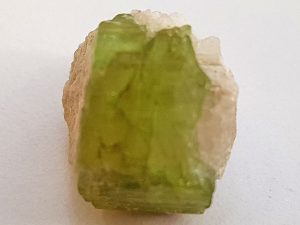 Green Tourmaline approx size 10 x 15 mm Being a natural product this crystal may have natural blemishes. www.naturalhealingshop.co.uk based in Nuneaton for crystals, spiritual healing, meditation, relaxation, spiritual development,workshops.