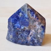 Polished Sodalite point approx size 60 mm Being a natural product this crystal may have natural blemishes. www.naturalhealingshop.co.uk based in Nuneaton for crystals, spiritual healing, meditation, relaxation, spiritual development,workshops.