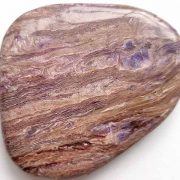 Highly polished Charoite comfort stone approx size 55 x 50 mm Being a natural product this crystal may have natural blemishes and vary in colour and banding. www.naturalhealingshop.co.uk based in Nuneaton for crystals, spiritual healing, meditation, relaxation, spiritual development,workshops.
