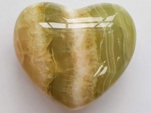 Highly polished Onyx Heart approx 45 mm. These hearts are perfect for a gift! There are purple velvet pouches or organza bags you can purchase to pop them into for the finishing touch. Being a natural product these stones may have natural blemishes and vary in colour and banding. www.naturalhealingshop.co.uk based in Nuneaton for crystals, spiritual healing, meditation, relaxation, spiritual development,workshops.
