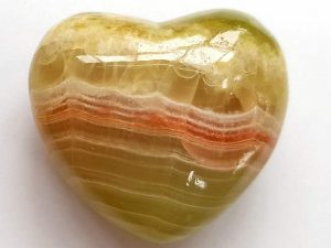 Highly polished Onyx Heart approx 45 mm. These hearts are perfect for a gift! There are purple velvet pouches or organza bags you can purchase to pop them into for the finishing touch. Being a natural product these stones may have natural blemishes and vary in colour and banding. www.naturalhealingshop.co.uk based in Nuneaton for crystals, spiritual healing, meditation, relaxation, spiritual development,workshops.