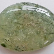 Highly polished Rutilated Epidote comfort stone approx size 50 x 40 mm Being a natural product this crystal may have natural blemishes and vary in colour and banding. www.naturalhealingshop.co.uk based in Nuneaton for crystals, spiritual healing, meditation, relaxation, spiritual development,workshops.
