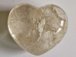 Highly polished Quartz Heart approx 45 mm. These hearts are perfect for a gift! There are purple velvet pouches or organza bags you can purchase to pop them into for the finishing touch. Being a natural product these stones may have natural blemishes and vary in colour and banding. www.naturalhealingshop.co.uk based in Nuneaton for crystals, spiritual healing, meditation, relaxation, spiritual development,workshops.