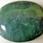 Highly polished Jade comfort stone approx size 60 x 45 mm Being a natural product this crystal may have natural blemishes and vary in colour and banding. www.naturalhealingshop.co.uk based in Nuneaton for crystals, spiritual healing, meditation, relaxation, spiritual development,workshops.