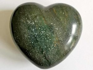 Highly polished Serpentine Heart approx 45 mm. These hearts are perfect for a gift! There are purple velvet pouches or organza bags you can purchase to pop them into for the finishing touch. Being a natural product these stones may have natural blemishes and vary in colour and banding. www.naturalhealingshop.co.uk based in Nuneaton for crystals, spiritual healing, meditation, relaxation, spiritual development,workshops.